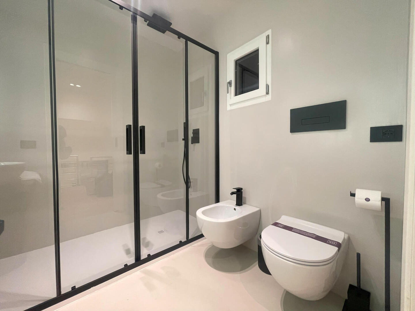 Spacious bathroom with walk-in shower.